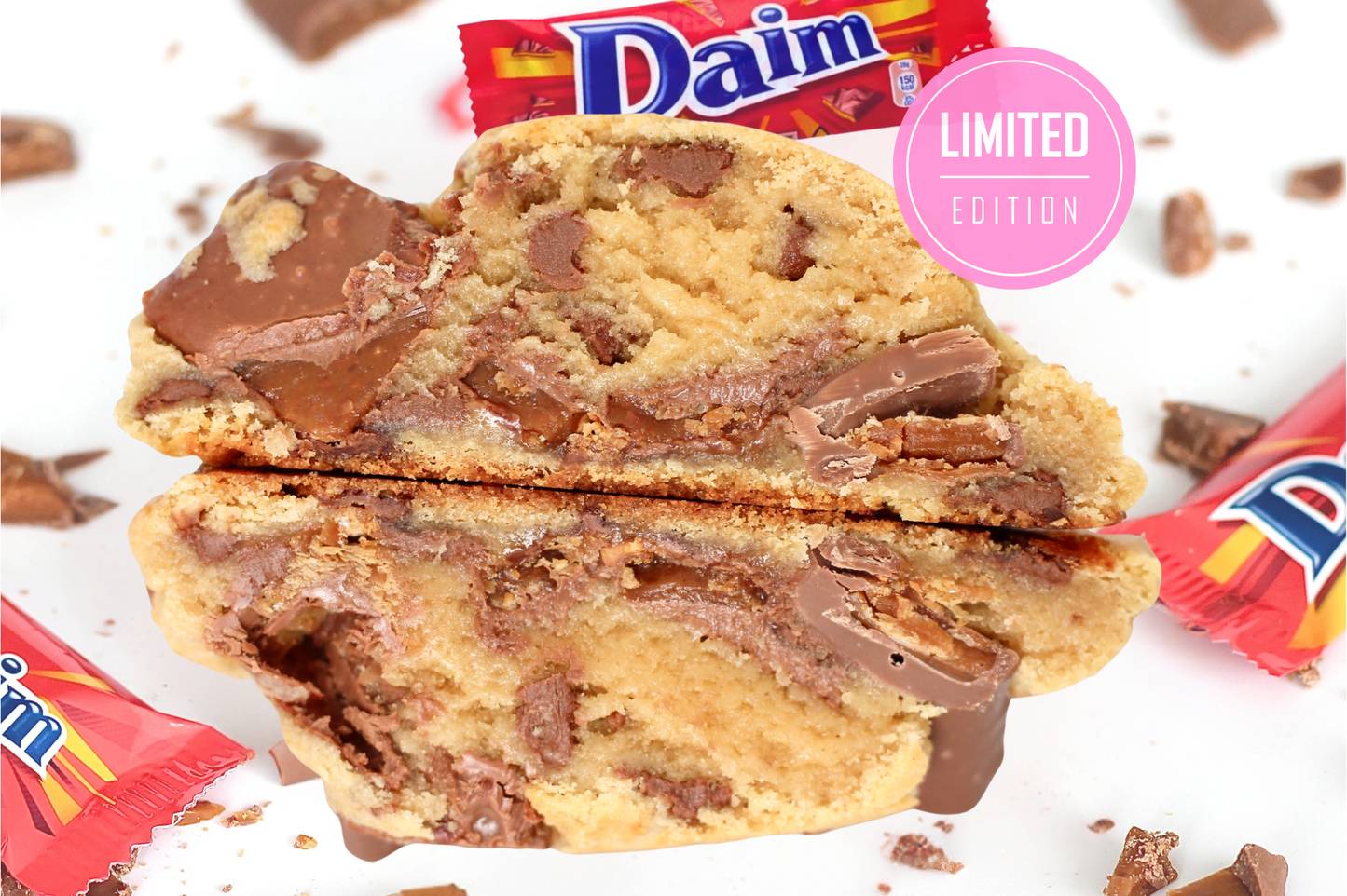 New York style Daim cookie cut in half showing gooey chocolate chips and crunchy caramel centre