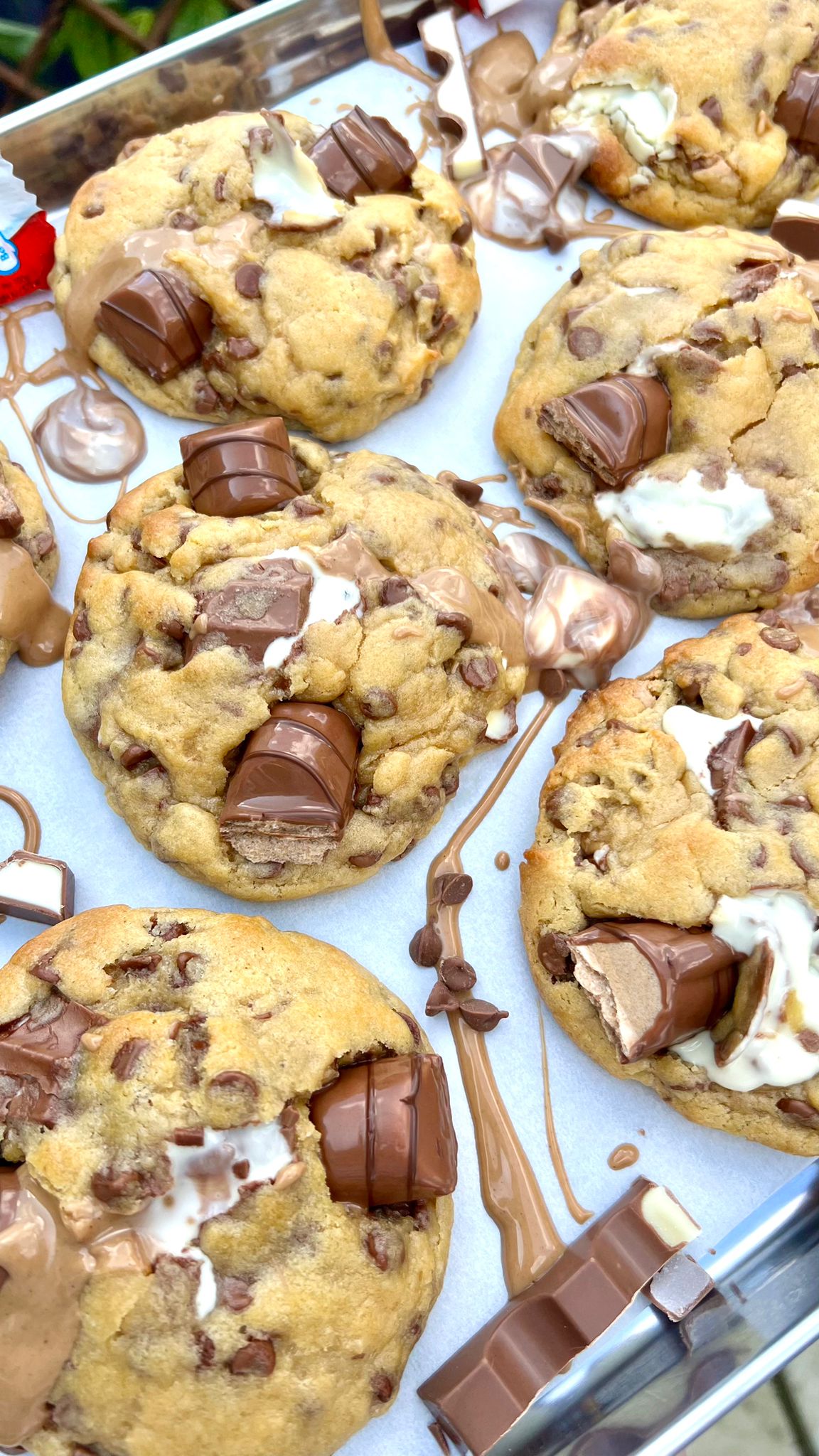 uy Bella Kinderella cookies online. Gooey centre, Belgian milk chocolate, and Kinder pieces.