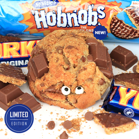 Hobgoblin Halloween cookie – Dolly’s Dough NYC-style cookie made with McVitie’s chocolate Hobnobs, chunky Yorkie pieces, and Belgian milk chocolate chips. Order online for UK-wide delivery.