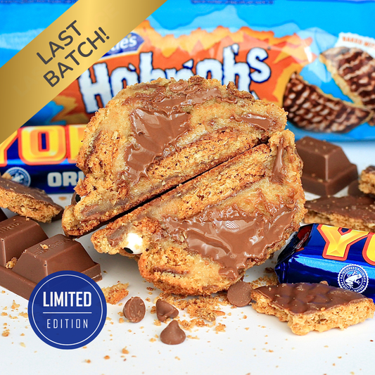 Close-up of Dolly’s Dough Hobgoblin NYC-style cookie packed with McVitie’s chocolate Hobnobs, chunky Yorkie pieces, and Belgian milk chocolate chips. Freshly baked and ready to order across the UK.